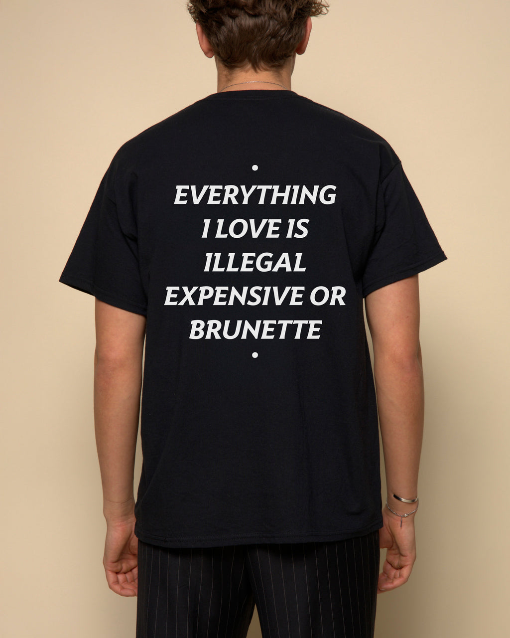 everything i love is illegal expensive or brunette t-shirt black. By FRASED. Unisex heavy cotton tee with a crew neckline and graphic screen print, made from 100% cotton, featuring a classic fit and tear-away label for comfort.